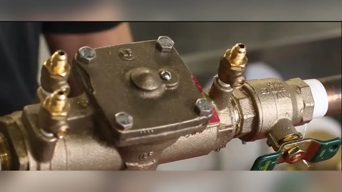 Close view of a backflow preventer and shutoff valves for backflow prevention testing in Laguna Niguel