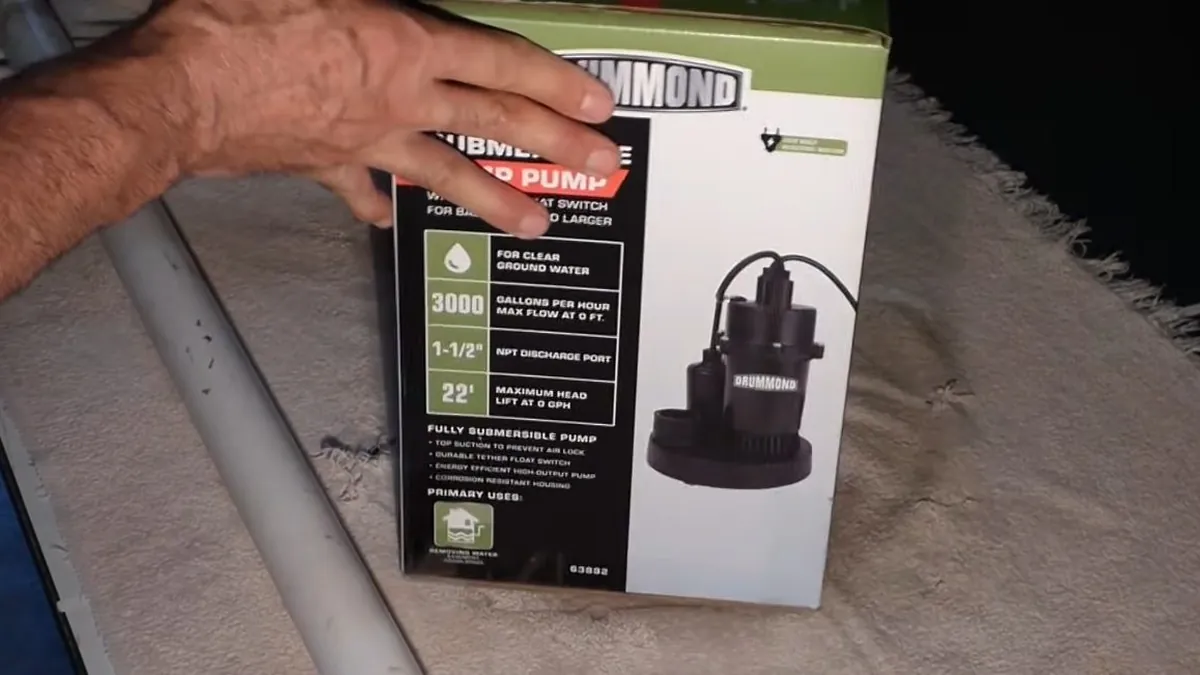 New sump pump beside PVC discharge components for residential plumbing service in Coto de Caza