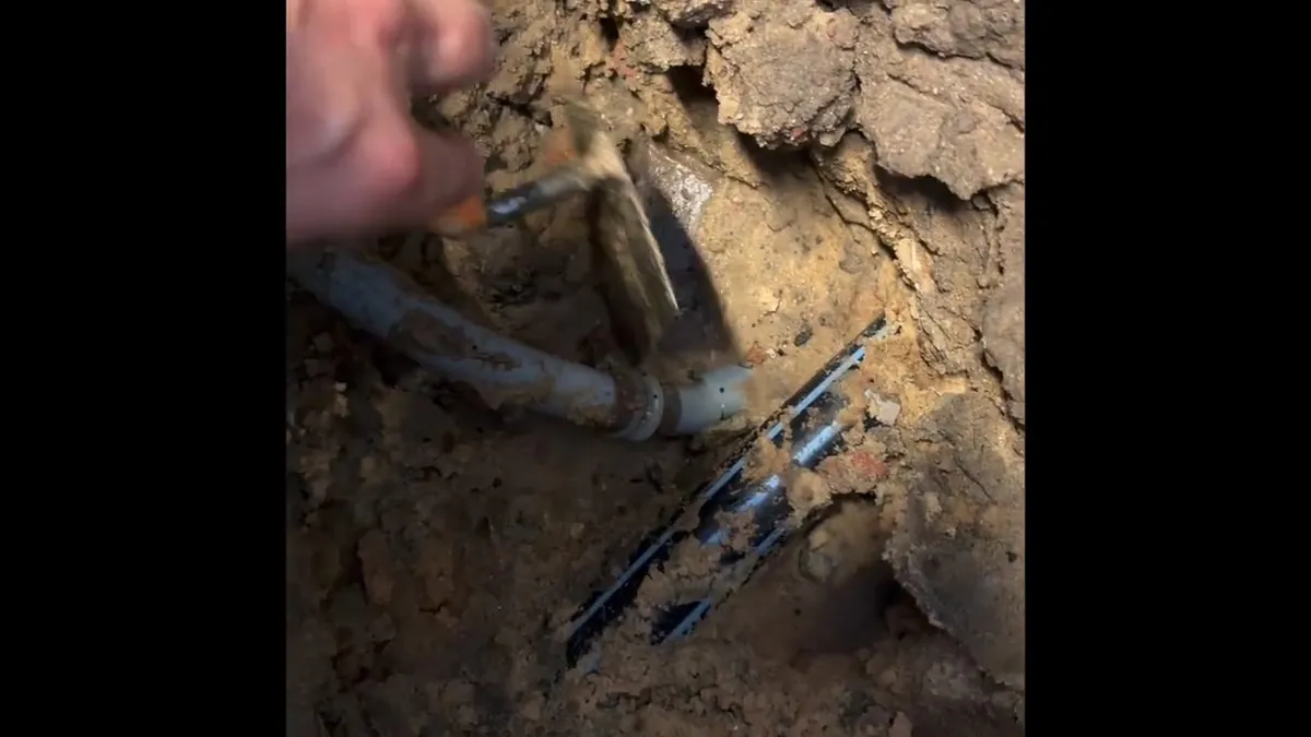 Exposed water pipes inside a slab excavation for slab leak detection repair in Laguna Niguel
