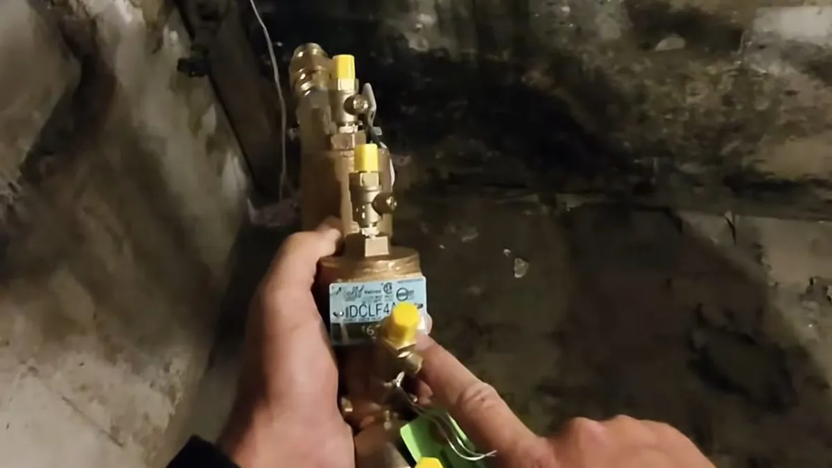 Close view of a gas line shutoff valve and fitting for gas line repair installation in Laguna Niguel