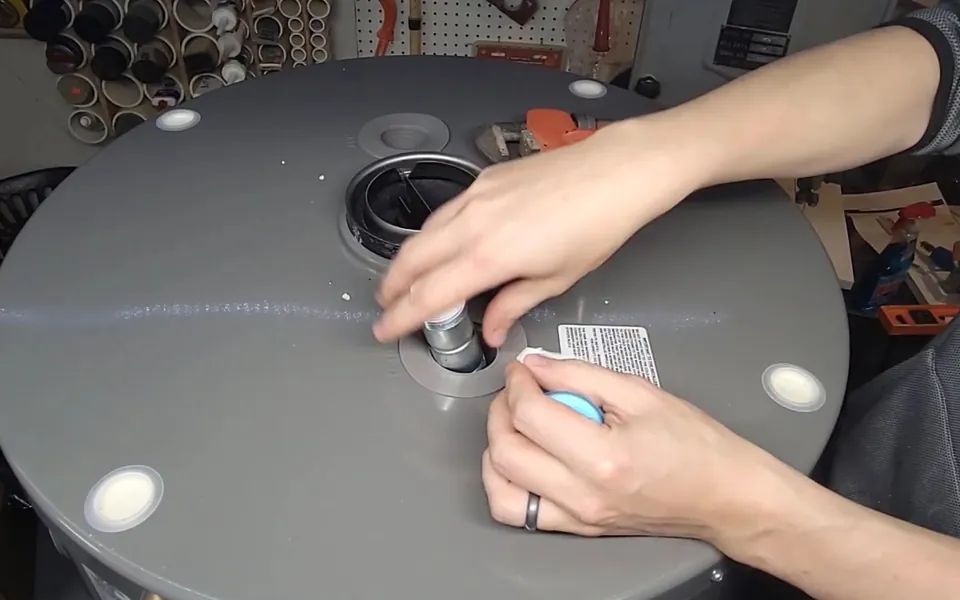 Top connections and vent on a gas water heater for residential plumbing service in El Niguel, Laguna Niguel