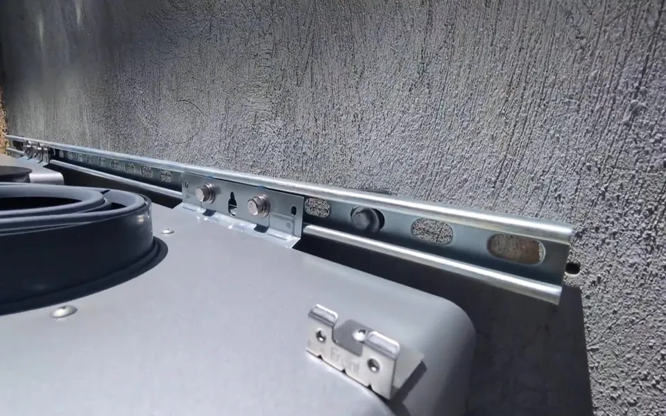 Mounting rail prepared for an outdoor tankless water heater for residential plumbing service in Laguna Beach