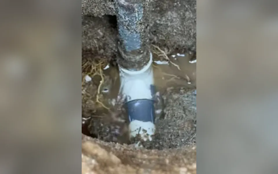Underground water pipe repaired with a new section for residential plumbing service in Aliso Viejo