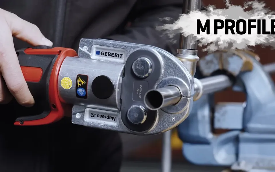 Powered press tool closing a plumbing fitting for repiping whole home pipe replacement in Laguna Niguel