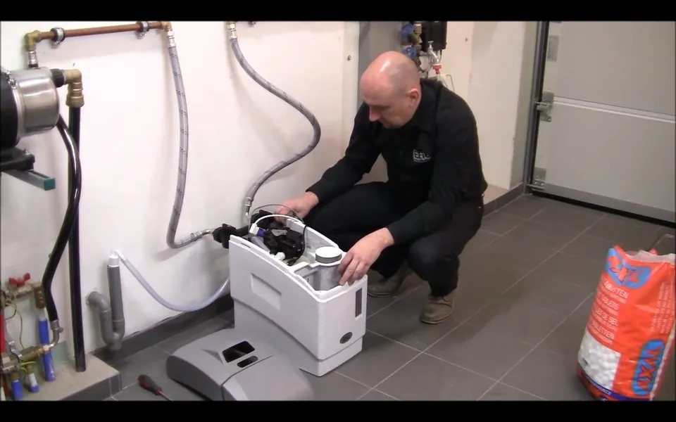 Residential water softener connected beside supply lines for residential plumbing service in Pacific Island, Laguna Niguel