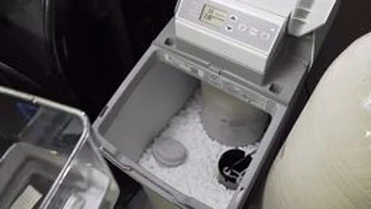 Salt and mineral residue visible inside a softener brine tank for MNWD water hardness and your plumbing in Laguna Niguel