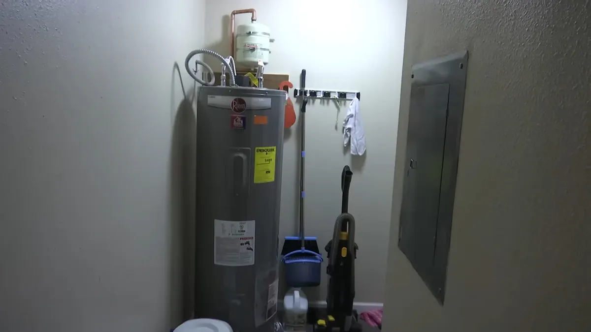 Tank water heater installed in a utility room for water heater repair in Laguna Niguel