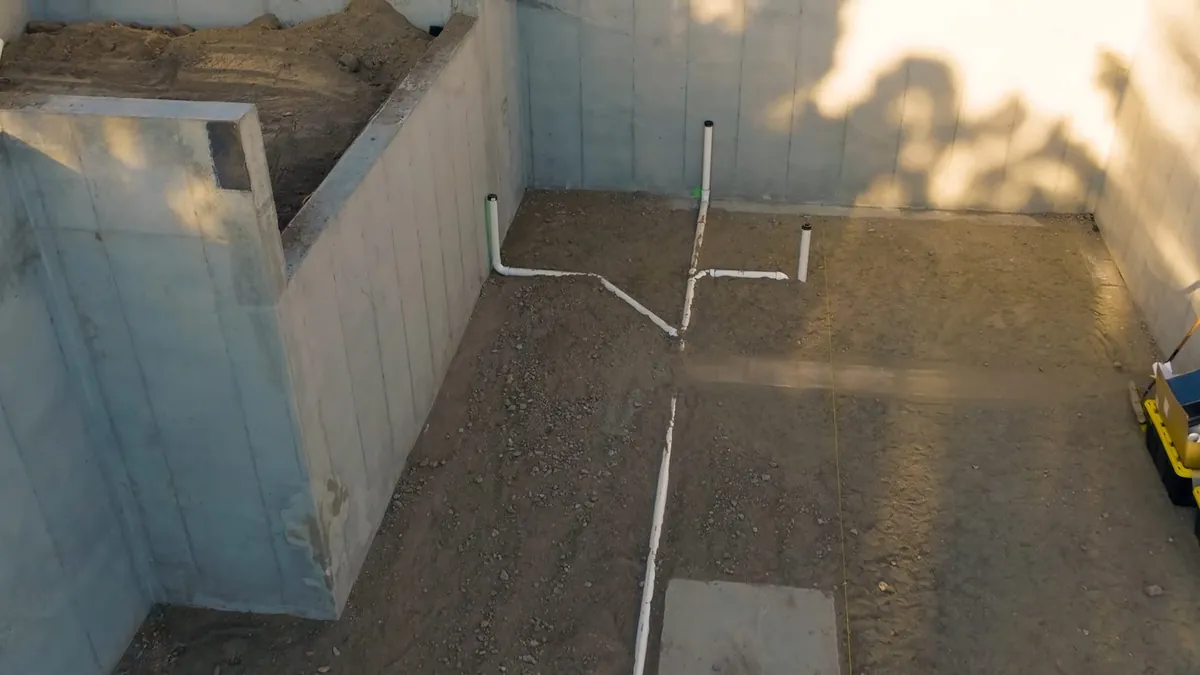 Under-slab plumbing rough-in before concrete placement for why homes get so many slab leaks in Laguna Niguel